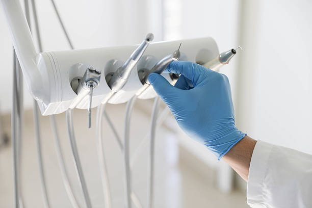 Professional Emergency Dentist technician working in Ferrysburg, MI